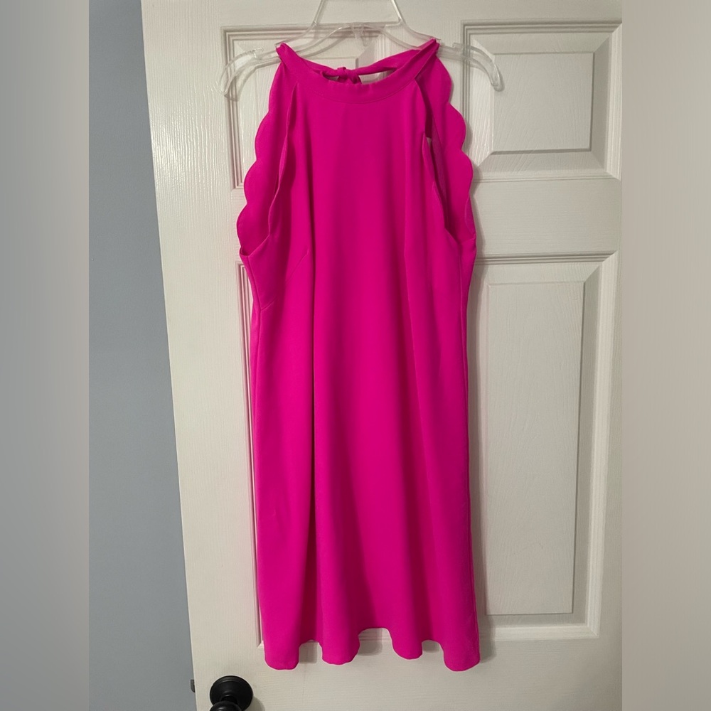 bright pink halter neck dress with scallop detailing.